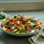 Steak and pasta salad served in a plate ceramic