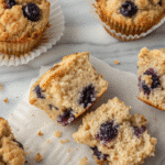 Freshly baked cottage cheese blueberry muffin with golden top