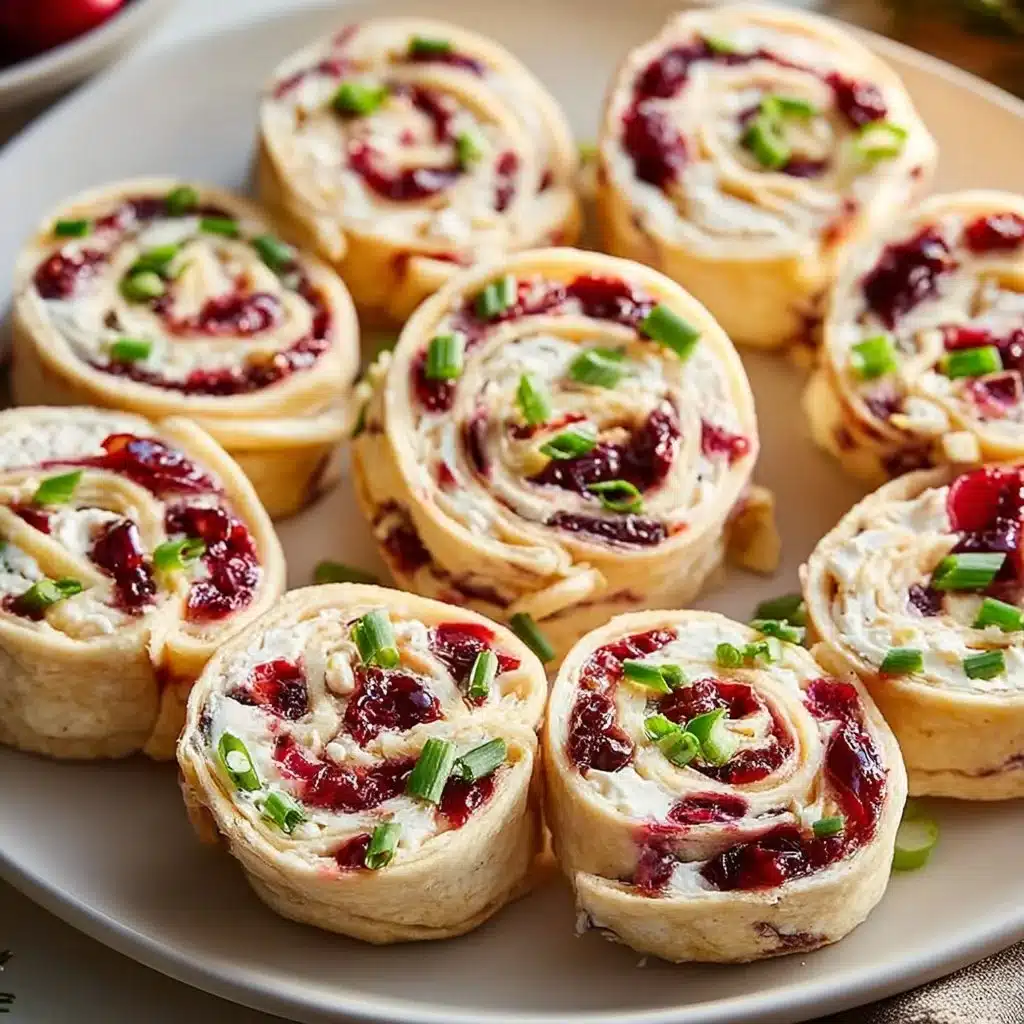 Festive Christmas Cranberry Roll Ups ready to serve at holiday celebrations.
